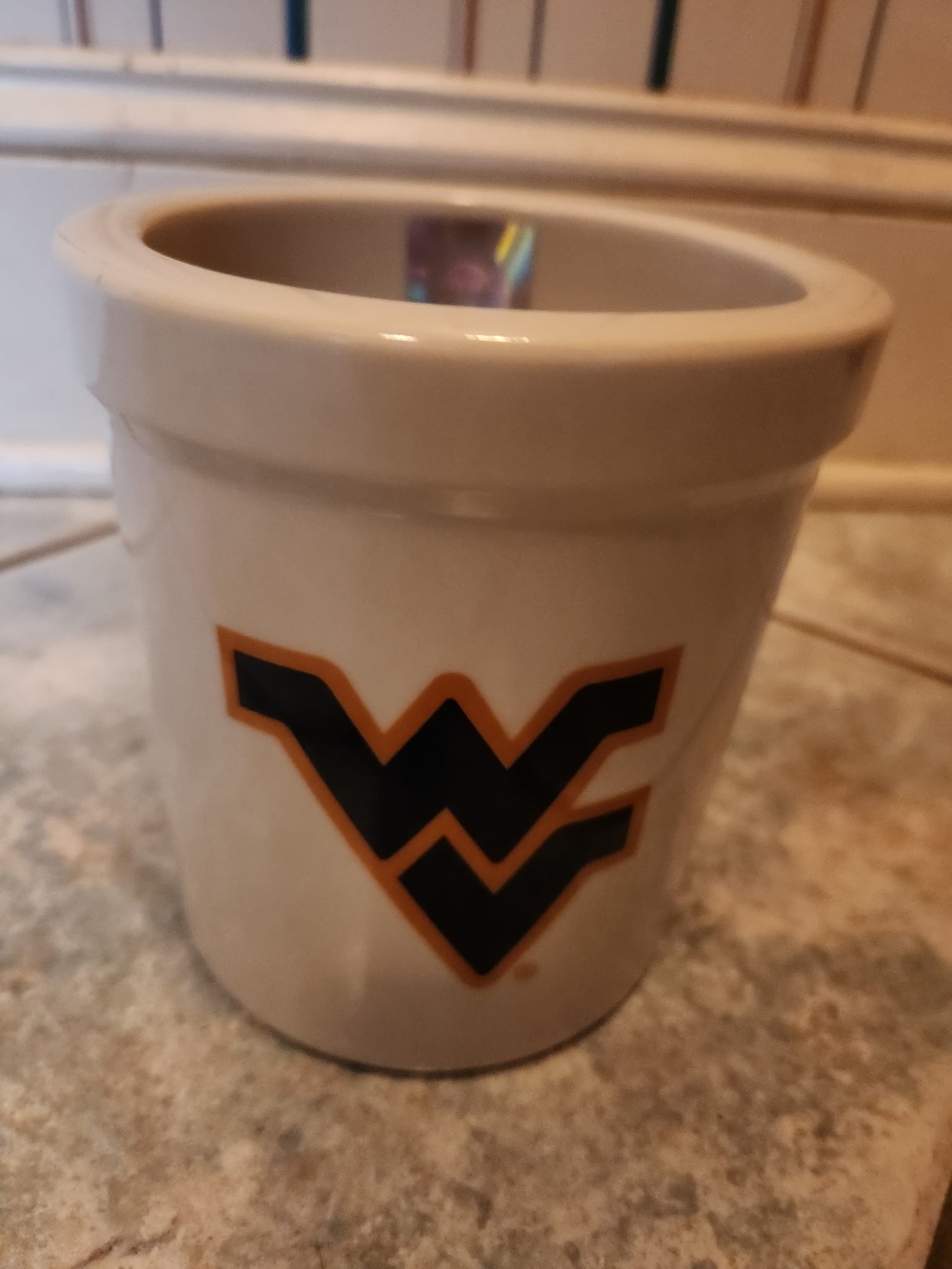West Virginia White Stoneware Crock with Blue and Gold Logo
